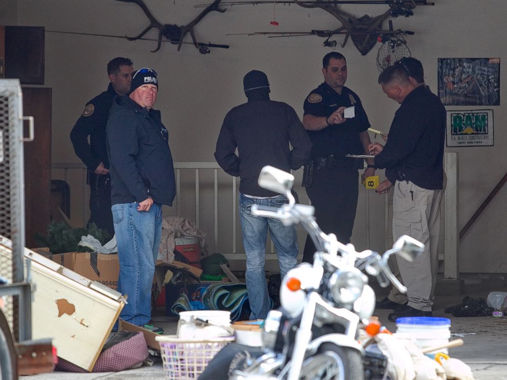 PHOTO: Authorities investigate a crime scene at a house in Pleasant Grove, Utah, Sunday, April 13, 2014. According to the Pleasant Grove Police Department, seven dead infants were found in the former home of Megan Huntsman, 39.