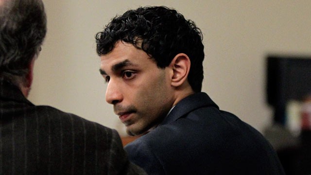 PHOTO: Defense attorney Steven Altman talks with Dharun Ravi during a break in his trial.