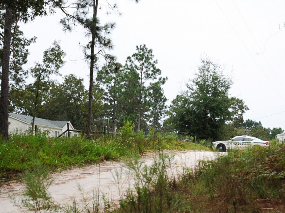 PHOTO: A Gilchrist County sheriffs vehicle sits on the property, Sept. 19, 2014, where 51-year-old Don Spirit allegedly shot and killed his adult daughter and six of his grandchildren, as well as himself in Bell, Fla.