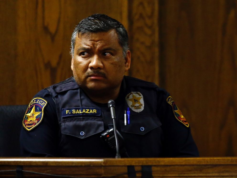 PHOTO: Lancaster police officer Flavio Salazar listens to a question from the defense during the capital murder trial of former Marine Cpl. Eddie Ray Routh in Stephenville, Texas on Feb. 17, 2015.