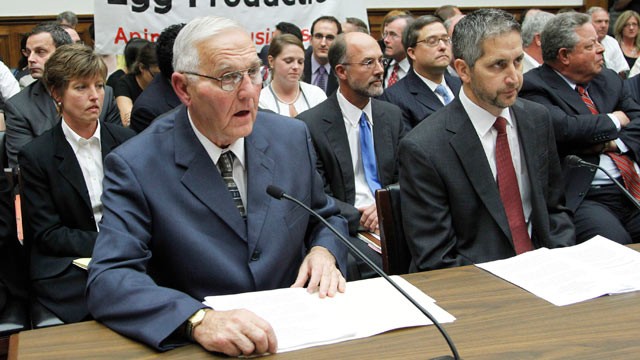 PHOTO: In this Sept. 22, 2010, file photo protestors unfurl a banner on Capitol Hill in Washington as Wright County Egg owner Austin DeCoster, left, testifies before the House Oversight and Investigations subcommittee hearing on the outbreak of salmonell