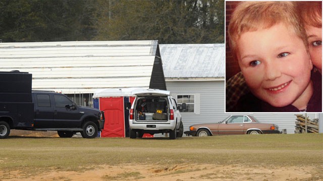 PHOTO: Law enforcement personnel station themselves on the property of Jimmy Lee Sykes, Feb. 4, 2013 in Midland City, Ala. Ethan, the 5-year-old boy held hostage in a nearly week-long standoff in Alabama is in good spirits and apparently unharmed.