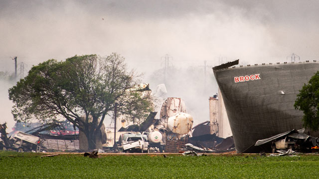 PHOTO: The remains of the the West Fertilizer Co. plant smolder in the rain, April 18, 2013, in West, Texas.