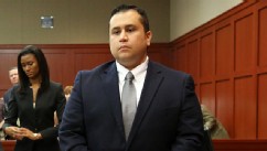 PHOTO: George Zimmerman stands in Seminole circuit court prior to the fourth day of his trial, in Sanford, Fla., June 13, 2013.