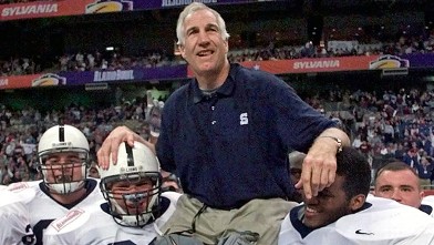 Jerry Sandusky being carried by players after the Alamo Bowl in San Antonio, Texas.