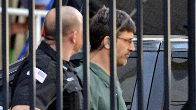 Glendon Scott Crawford, 49, of Galway, N.Y., leaves the federal courthouse in shackles after being arraigned June 19, 2013, in Albany, N.Y.