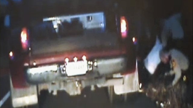 PHOTO: This frame grab from dashboard video provided Nov. 8, 2011, by the Wisconsin State Patrol shows troopers assisting Victor Giesbrecht of Winnipeg, Canada.