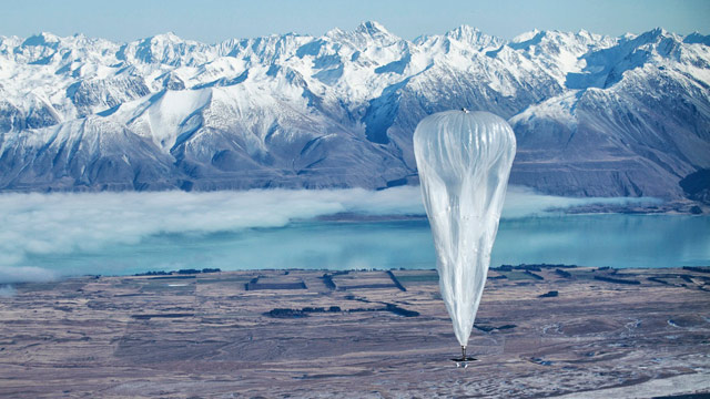 A Google balloon sails through the air with the Southern Alps mountains in the background, in Tekapo, New Zealand, on June 10, 2013.