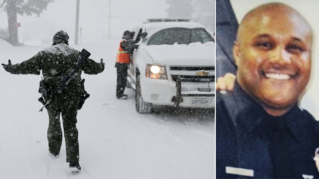 PHOTO: San Bernardino Sheriff's Department officer Steven Spagon mans a check point during the search for fired Los Angeles officer, Christopher Dorner in Big Bear Lake, Calif., Feb. 8, 2013.
