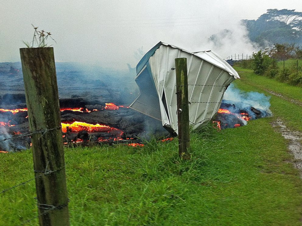 PHOTO: A small shed is consumed by lava in a pasture between the Pahoa cemetery and Apaa Street near the town of Pahoa on the Big Island of Hawaii, Oct. 25, 2014.