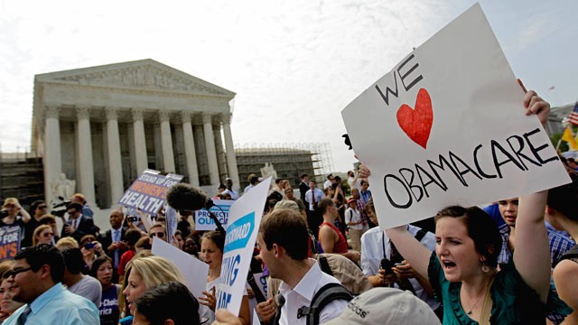 PHOTO: Supporters of President Barack Obama's health care law celebrate outside the Supreme Court in Washington on June 28, 2012, after the court's ruling was announced.