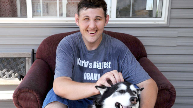 PHOTO: Igor Vovkovinskiy, 27, poses for a photo with his dog in Rochester, Minn., Sept. 18, 2009.