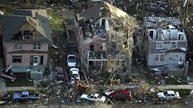 PHOTO: Houses are damaged along Iowa Avenue east of downtown Iowa City, Iowa, April 14, 2006, after a tornado hit the city. A recent study explains how people get on with their lives after such a harrowing experience.