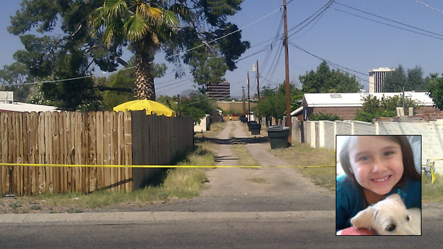 PHOTO: An alley path behind the street where Isabel Mercedes Celis went missing from her home is cut off with police tape in Tucson, Ariz., April 22, 2012.
