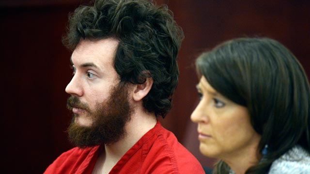 PHOTO: James Holmes sits with defense attorney Tamara Brady during his arraignment in district court in Centennial, Colo., March 12, 2013.