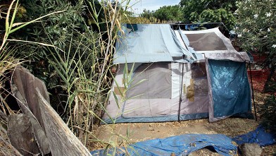 PHOTO: A tent is set up in the far backyard of a home in Antioch, Calif., where authorities say kidnap victim Jaycee Lee Dugard lived.