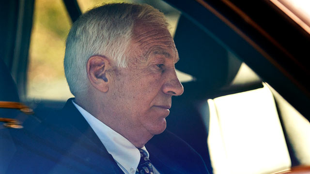 PHOTO: Gerald "Jerry" Sandusky sits in a car as he leaves the office of Center County Magisterial District Judge Leslie A. Dutchcot.