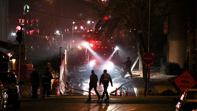 PHOTO: Firemen and utility workers respond to a gas explosion and massive fire on Feb. 19, 2013 in the Plaza shopping district in Kansas City, Mo. where a car crashed into a gas main in the upscale shopping district, sparking a massive blaze that engulfed