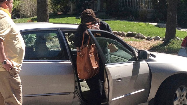 PHOTO: Katherine Russell Tsarnaev, center, wife of killed Boston Marathon bombing suspect Tamerlan Tsarnaev, exits a car at the home of her parents in North Kingstown, R.I., April 21, 2013. At left is her father, Warren Russell.