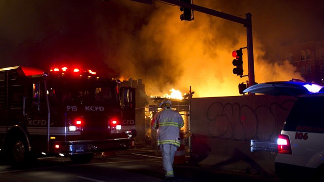 PHOTO: Firefighters on the scene of a gas explosion and massive fire Tuesday night, Feb. 19, 2013 at JJs restaurant at the Country Club Plaza in Kansas City, Mo.