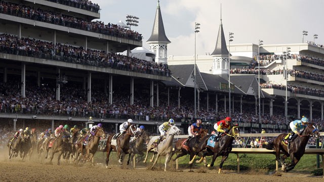 PHOTO: Bodemeister with jockey Mike Smith leads the field around the first turn in the 138th Kentucky Derby horse race at Churchill Downs Saturday, May 5, 2012, in Louisville, Ky.