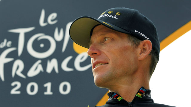 PHOTO: Lance Armstrong looks back on the podium after the 20th and last stage of the Tour de France cycling race in Paris, July 25, 2010.