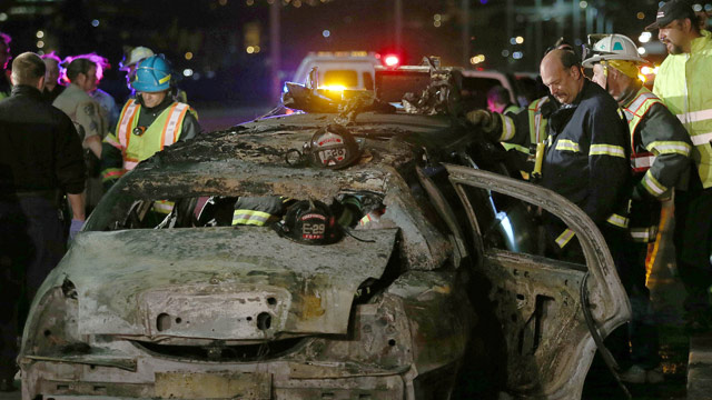 PHOTO: San Mateo County firefighters and California Highway Patrol personnel investigate the scene of a limousine fire on the westbound side of the San Mateo-Hayward Bridge in Foster City, Calif., on Saturday, May 4, 2013.