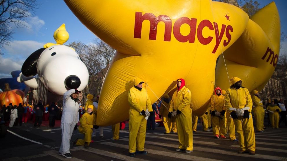 PHOTO: Balloon handlers wait before the 87th Annual Macys Thanksgiving Day Parade on Nov. 28, 2013, in New York.