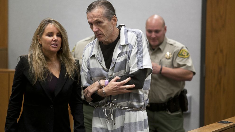 PHOTO: Martin MacNeill speaks to his defense lawyer Susanne Gustin in Fourth District Court in Provo, Utah during a preliminary hearing, Oct. 10, 2012.