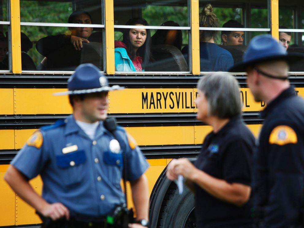 PHOTO: Marysville-Pilchuck students are bussed from the high school to the nearby Shoultes Christian Assembly Church where they were reunited with their families after a school shooting took place, Oct. 24, 2014.