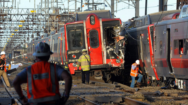 PHOTO: Emergency personnel work at the scene where two Metro North commuter trains collided, Friday, May 17, 2013 near Fairfield, Conn.