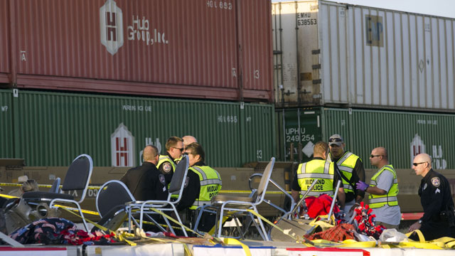 PHOTO: Midland police, fire and sheriffs respond to an accident where a trailer carrying veterans in a parade was struck by a train crossing in Midland, Texas, Thursday, Nov. 15, 2012.