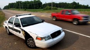 PHOTO: A DeSoto County Sheriff car patrols along Mississippi Highway 301, May 14, 2012, providing higher visibility following two recent roadway killings.