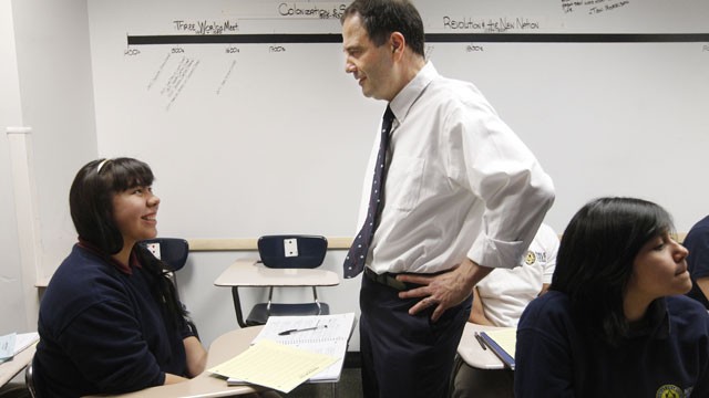 PHOTO: Noble Street College Prep CEO Mike Milke talks with student Gabriela Cervantes during school in Chicago, Feb. 16, 2012.