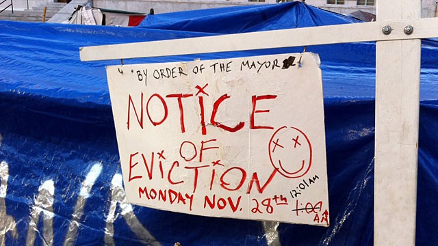 PHOTO: An eviction notice sign posted at the Occupy LA encampment on the grounds of Los Angeles City Hall.
