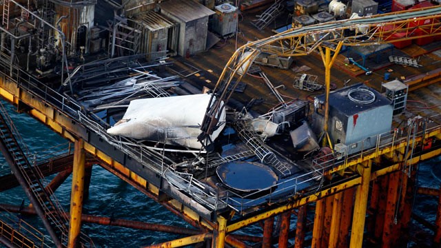 PHOTO: This aerial photograph shows damage from an explosion and fire on an oil rig in the Gulf of Mexico, about 25 miles southeast of Grand Isle, La., Nov. 16, 2012.