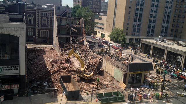 PHOTO: Emergency personnel respond to a building collapse in downtown Philadelphia, where the city fire commissioner says as many as eight to 10 people are believed trapped in the rubble, June 5, 2013.