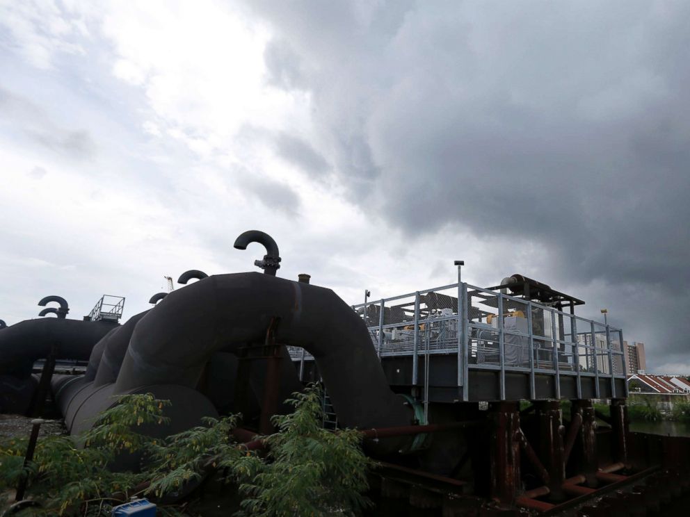 PHOTO: In this Aug. 10, 2017 file photo, rain clouds gather over the 17th Street Canal pumping station in New Orleans. Flood-weary New Orleans braced Thursday for the weekend arrival of Hurricane Nate, forecast to hit the area Sunday.