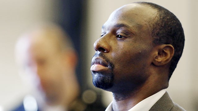 PHOTO: Ricardo Woods stands in front of Judge Beth Myers with his attorney as he is sentenced, June 20, 2013 in Cincinnati.