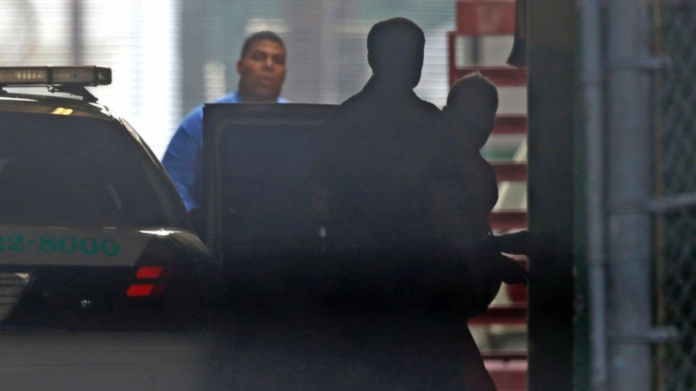 PHOTO: Robert Durst, far right, is escorted into Orleans Parish Criminal District Court through a tunnel entrance, in New Orleans, March 16, 2015.