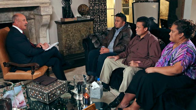 PHOTO: Talk show host Dr. Phil McGraw, left, interviews Ronaiah Tuiasosopo, center, and his parents, Titus and Cheannie Tuiasosopo, during taping for the "Dr. Phil Show" in Los Angeles.