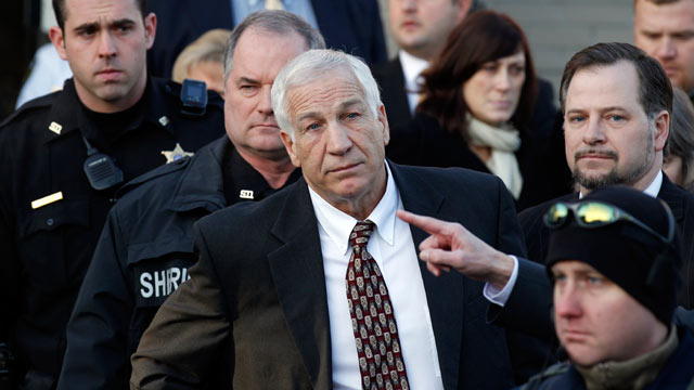 PHOTO: This Dec. 13, 2011 file photo shows Jerry Sandusky, center, a former Penn State assistant football coach charged with sexually abusing boys, pausing as his attorney Joe Amendola makes a point as they depart the Centre County Courthouse in Bellefont