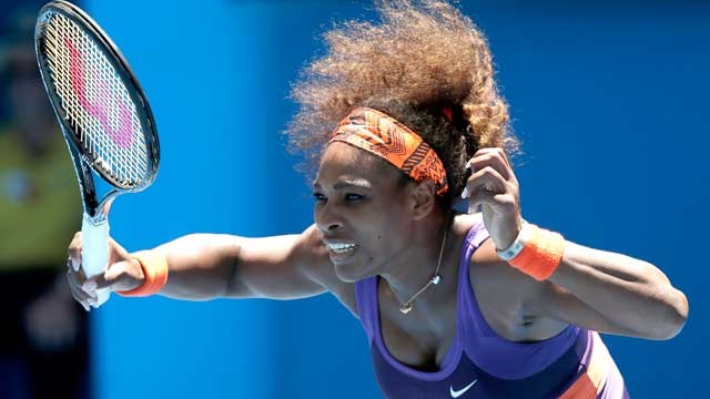 PHOTO: Serena Williams hits forehand return to compatriot Sloane Stephens during their quarterfinal match at the Australian Open tennis championship in Melbourne, Australia, Jan. 23, 2013.