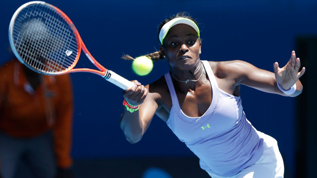PHOTO: Sloane Stephens of the US hits a forehand return to compatriot Serena Williams during their quarterfinal match at the Australian Open tennis championship in Melbourne, Australia on Jan. 23, 2013.