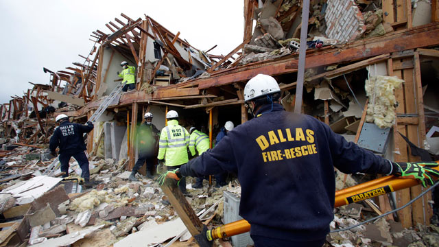 PHOTO: Firefighter conduct search and rescue of an apartment destroyed by an explosion at a fertilizer plant in West, Texas, April 18, 2013.