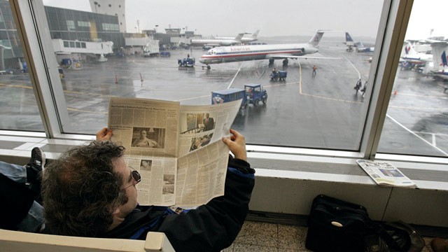 PHOTO: Passenger waits for flight at LaGuardia Airport