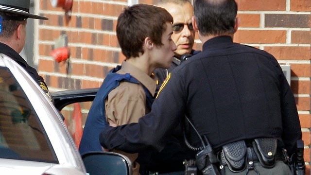PHOTO: T.J. Lane, a suspect in the shooting of five students at Chardon High School is taken into juvenile court by Geauga County deputies in Chardon, Ohio.