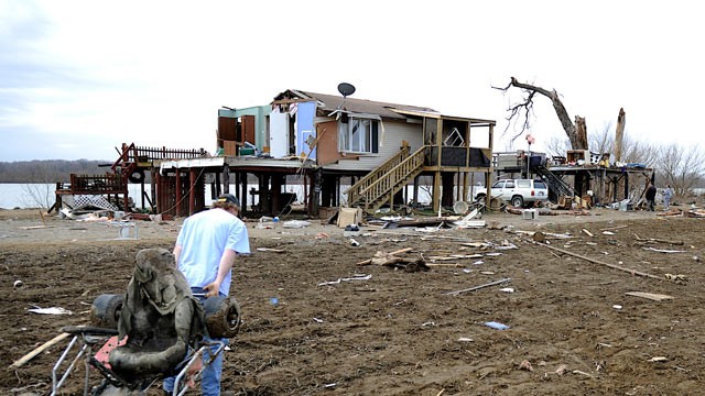 PHOTO: Terry Means tries to pull a go-cart back to a friends home in Henderson Ky., Feb. 29, 2012.
