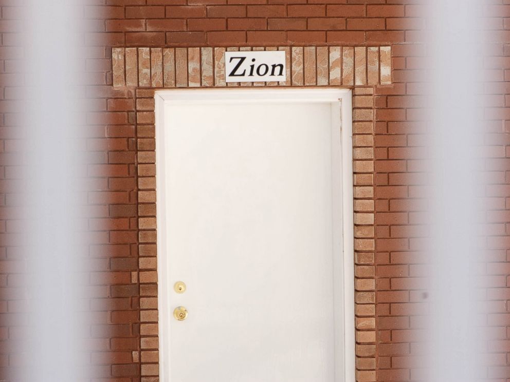 PHOTO: In this April 26, 2013 photo, a sign reads, Zion, over the door of a home intended for the family of Warren Jeffs in Hildale, Utah.