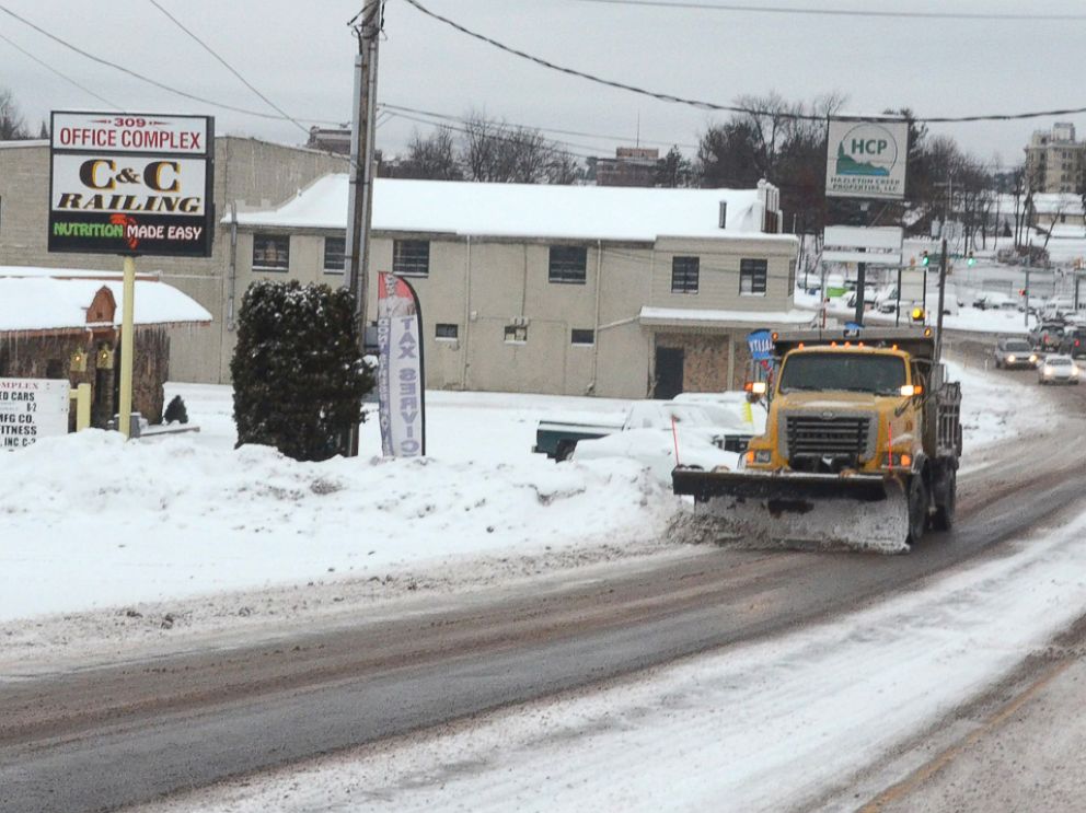 PHOTO: A driver of a PennDOT plow truck clears snow off of South Church Street, in Hazleton Pa., Jan. 26, 2015.